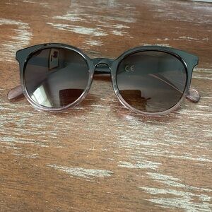 Cocosand pink transparent fade sunglasses.